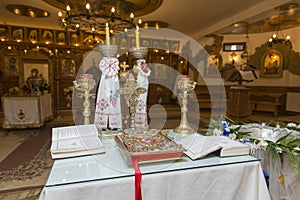 Holy Bible and other books on the priest table 