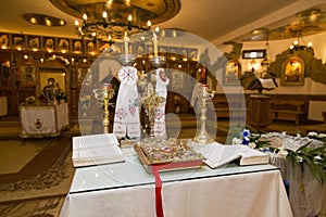 Holy Bible and other books on the priest table 