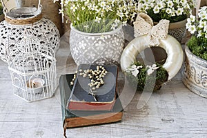 Holy Bible and white rosary among first communion decorations