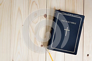 Holy bible on wood table