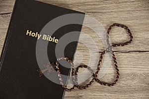 Holy Bible with wooden cross