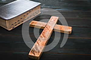 Holy Bible with wooden cross