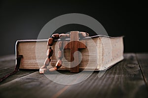 Holy Bible with wooden cross