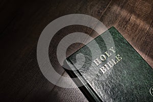 Holy Bible on a wooden table