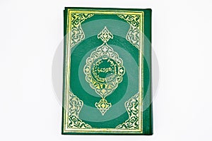 The Holy Book of Muslims, the Qur`an book green.