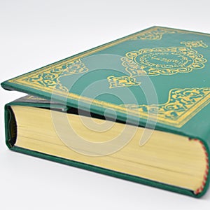 The Holy Book of Muslims, the Qur`an book green.