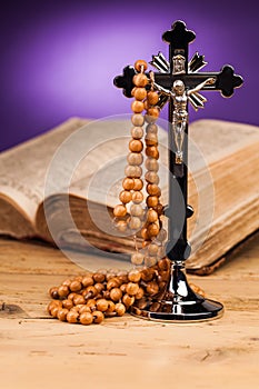 Holy book rosary and crucifix