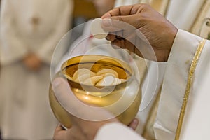 The Holy Bread during the Communion