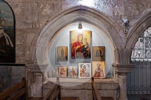 The holy  christian icons in the interior of the St. Jacobs orthodox  cathedral Jerusalem in Christian quarters in the old city of