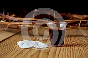 Holy Communion, a Cup of Wine and Bread with a Jesus Crown Thorn and Holy Bible