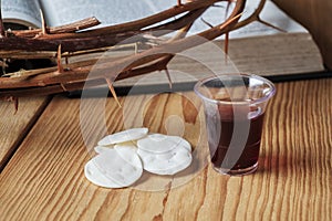 Holy Communion, a Cup of Wine and Bread with a Jesus Crown Thorn and Holy Bible