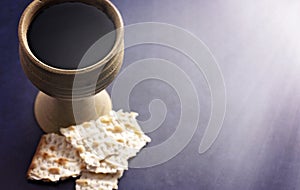 Holy Communion on a Dark Blue Surface in the Sunlight