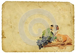 Holy communion elements on old paper background photo