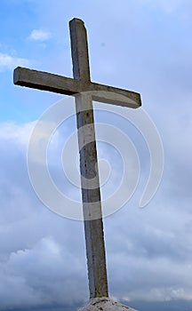 Holy Cross Against Cloudy Blue Sky