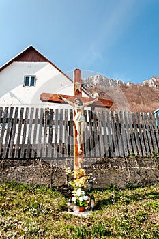 The holy cross on Vrsatec mountain and village with hotel