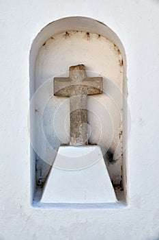 Holy cross in a wall niche. Mertola. Portugal.