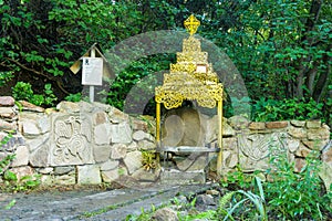 Holy Face on the rock face of altar and in the spring of his grandfather taran - source of the river photo