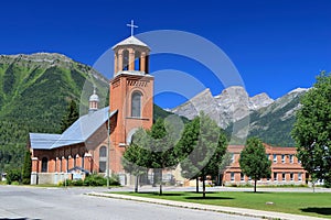 Holy Family Church with Rocky Mountains Panorama at Fernie, British Columbia, Canada photo
