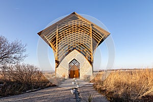 Holy Family Shrine Gretna Nebraska with fall dry grass