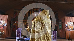 The holy father reads a prayer in the church before the ritual of baptism. Secret rite of baptism in the orthodox church