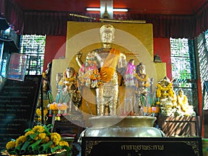 Holy graven image in Phra Kal shrine photo