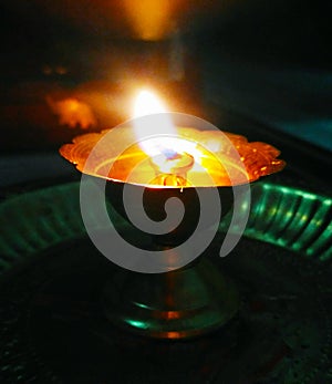 A holy lamp lit during workship photo