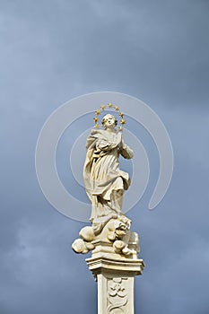 Holy Mary column in Frohnleiten, Austria with dramatic clouds