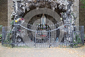 Holy Mary statue in chapel with the appearance of a grotto