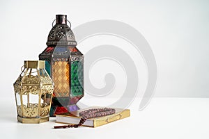 Holy quran and arabic lantern background