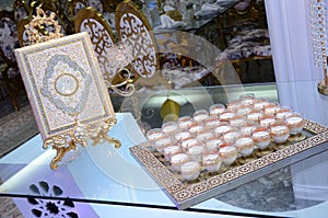 The Holy Quran and Milk to receive Moroccan wedding guests