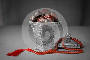 Sacred sweet dates and Islamic praying beads.