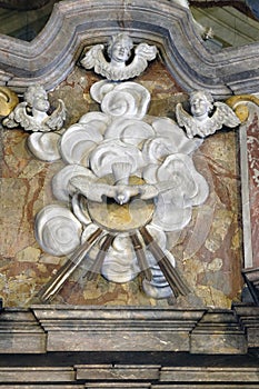 Holy Spirit is surrounded by angels, statue on the main altar in the Saint John the Baptist church in Zagreb