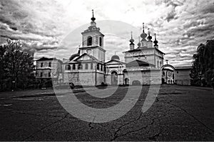 Holy Trinity Belopesotsky Convent in the cloudy autumn afternoon in a distance