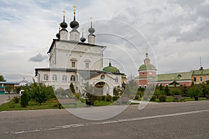 Holy Trinity Belopesotsky Convent in the cloudy autumn afternoon in a distance