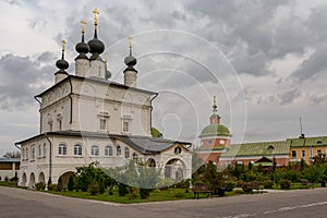 Holy Trinity Belopesotsky Convent in the cloudy autumn afternoon in a distance