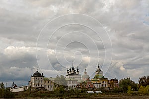 Holy Trinity Belopesotsky Convent in the cloudy autumn afternoon in a distance