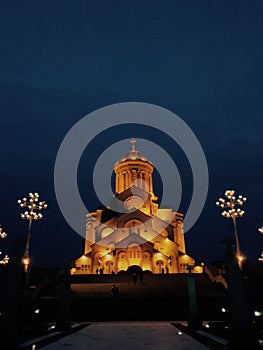 The Holy Trinity Cathedral or Tsminda Sameba Church at night in Tbilisi, Georgia