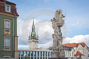 Holy Trinity Column at Cabbage Market Square Zelny trh and Old Town Hall Tower - Brno, Czech Republic photo