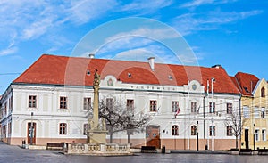 Holy Trinity column and Late-baroque Town Hall Varoshaza Building at Fo ter Square in Keszthely, Hungary