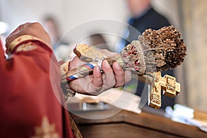 Holy water consecration in orthodox church. Religious priest during service