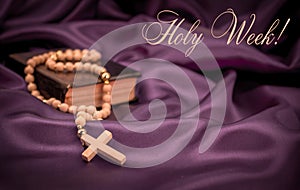 Holy week Bible rosary beads on purple background