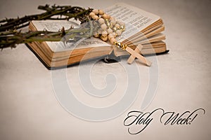 Holy week text. Bible book with rosary beads thorn crown