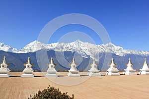 Holy white stupas by Feilai Temple overlooking the Meili Snow Mountain in Deqin