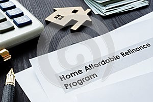 Home Affordable Refinance Program HARP papers. photo