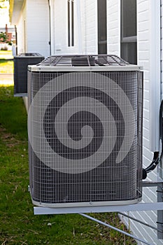 home air conditioner compressor system in backyard