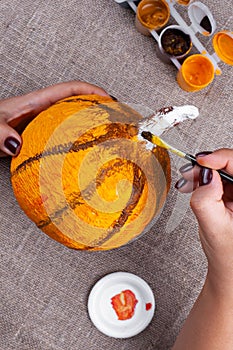 Home autumn crafts from papier mache, pumpkin for Halloween, making process, hobby