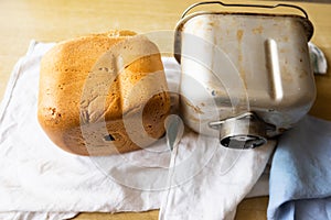 Home Baked Bread. .Freshly made white bread is removed from