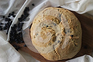 Home baked Irish soda bread with raisins. A quick bread to make at home with out yeast