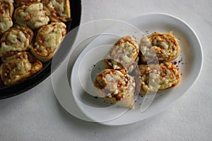 Home baked mozzarella pizza rolls
