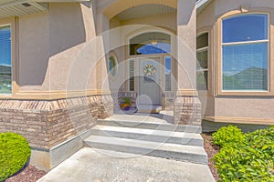 Home with bay windows near entry